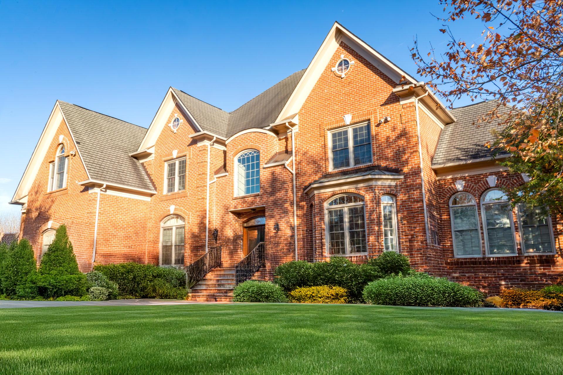 Brick home with Fortis Beige windows