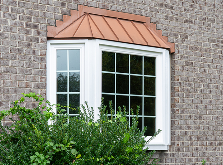 Vytex bay window with copper roof