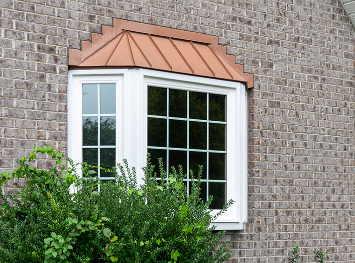 Vytex bay window with copper roof