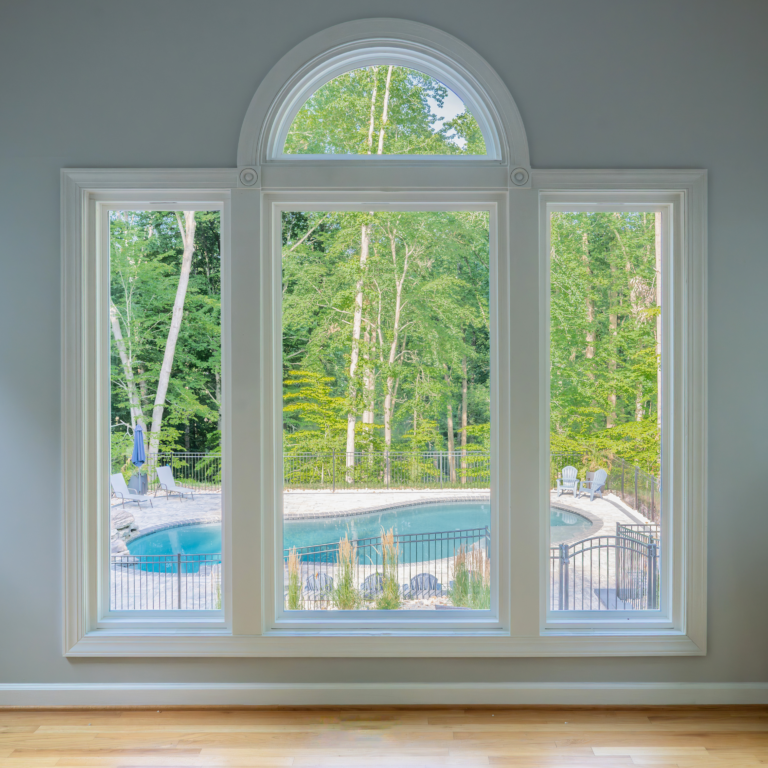 Georgetown series windows with an arch overlooking a pool